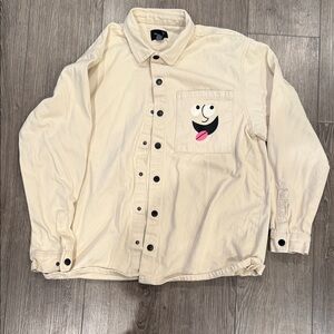 Cream Button-Up Shirt Jacket with Playful Pocket Graphic
